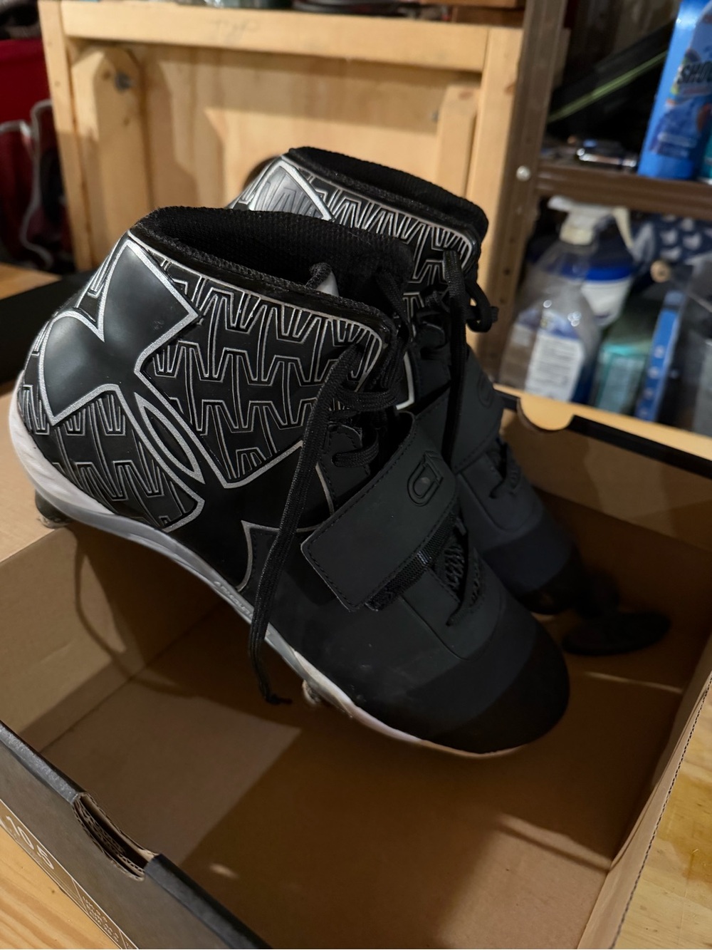 Under Armour Men’s Black and White High-Top Athletic Cleats